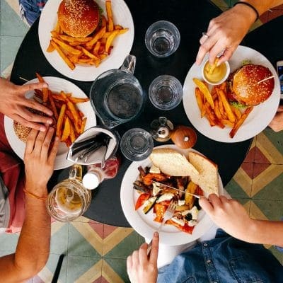 4 people eating a meal